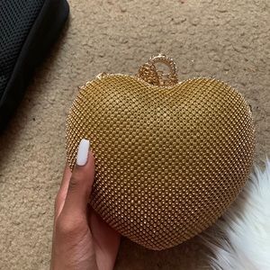 Cute gold heart shaped purse ( can be worn as a clutch as well)